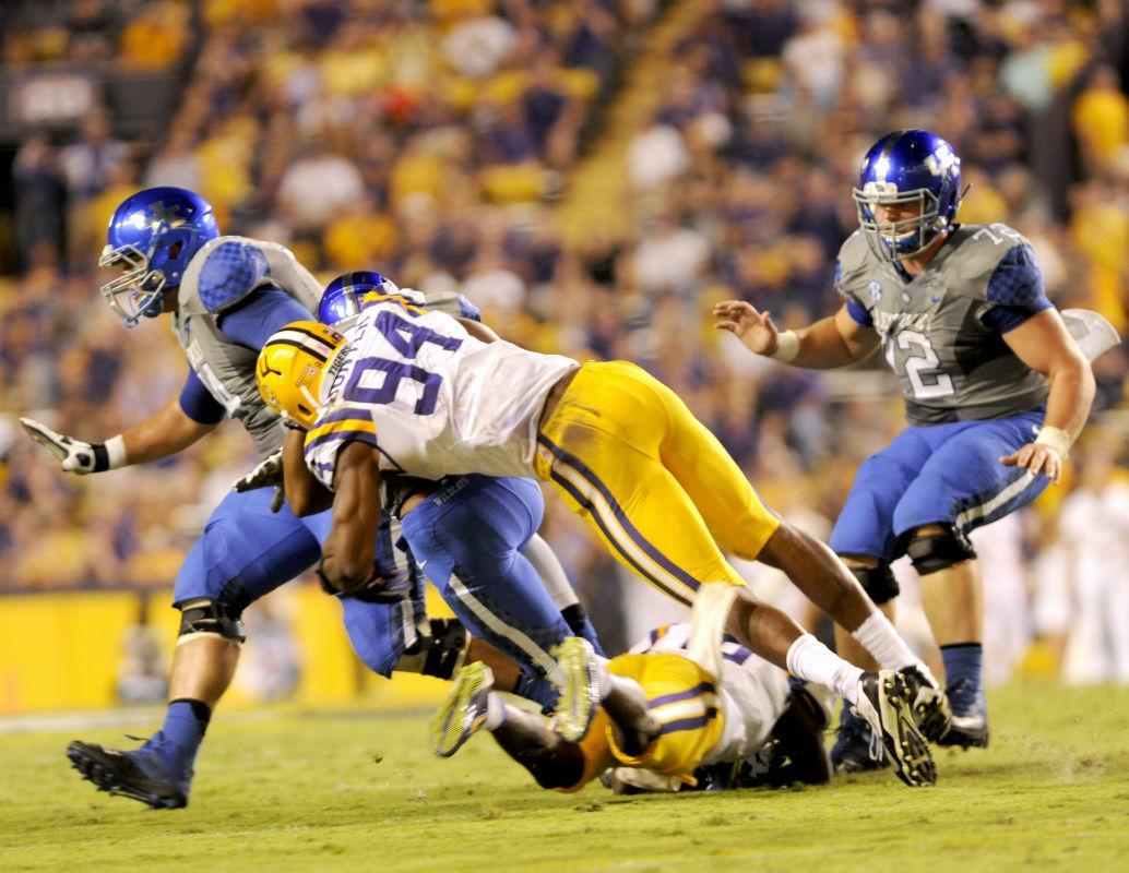 Junior defensive end Danielle Hunter (94) makes a tackle during the Tigers' 42-3 win vs Kentucky on Saturday, October 18th, 2014.