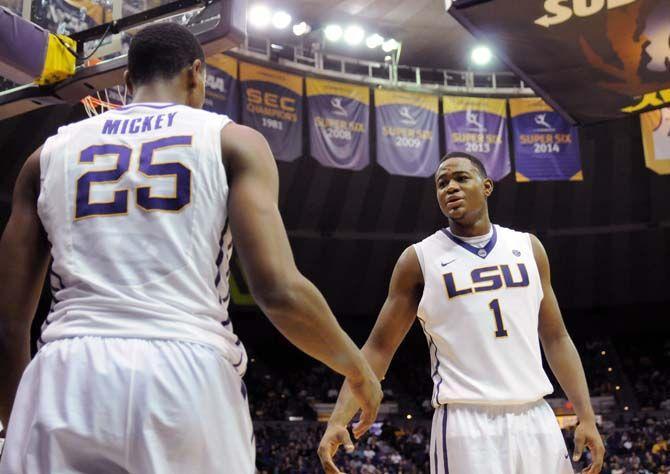 LSU sophomore forward Jarell Martin (1) congratulates sophomore forward Jordan Mickey (25) after blocking an opponent during Tigers' 67-64 defeat against Texas A&amp;M on Sturday, Jan. 17, 2015 in the Pete Maravich Assembly Center.