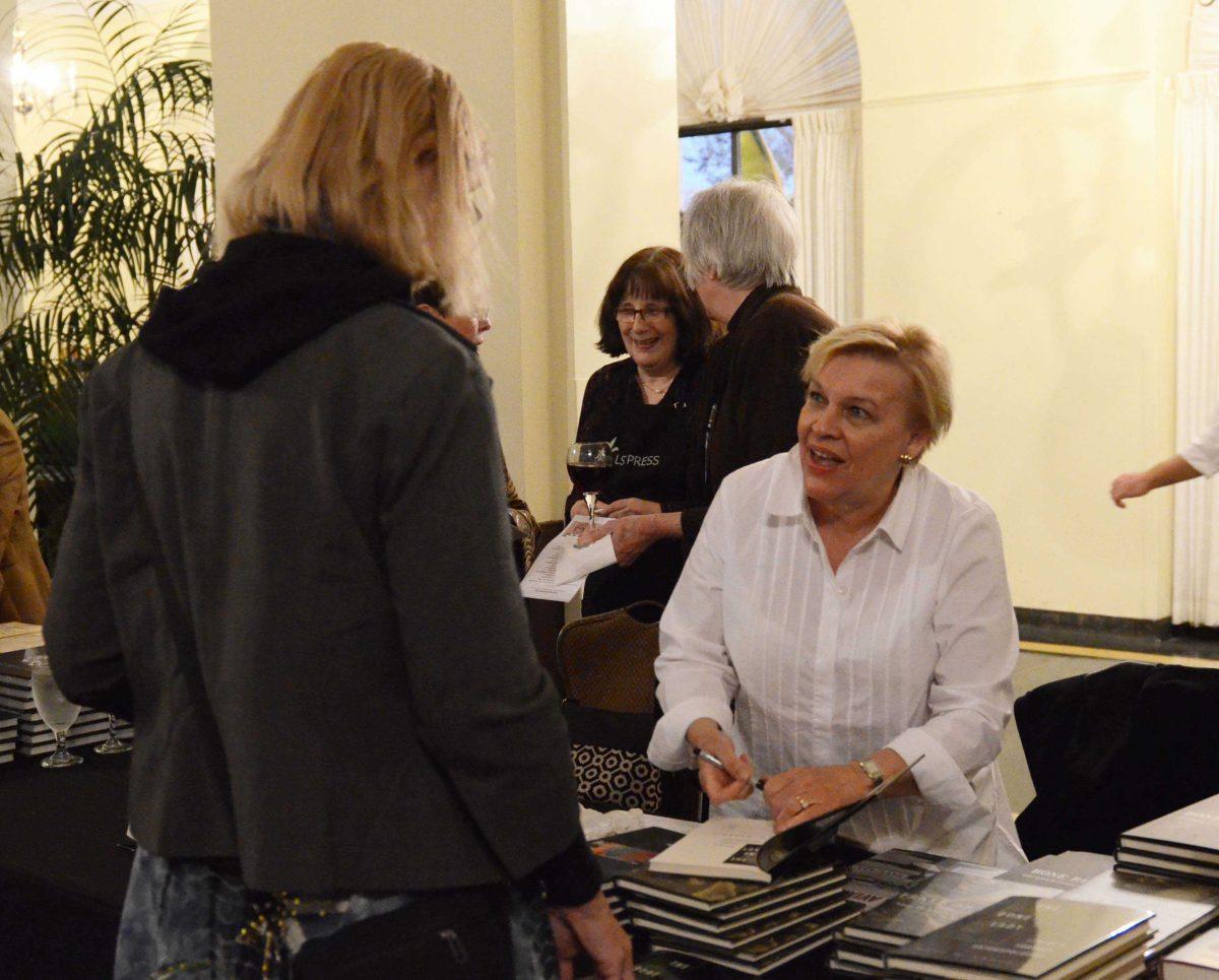 Mary Manhein, author of Bone Remains, signs her books at LSU Press Holiday Book Sale at the Faculty Club, November 21, 2014.