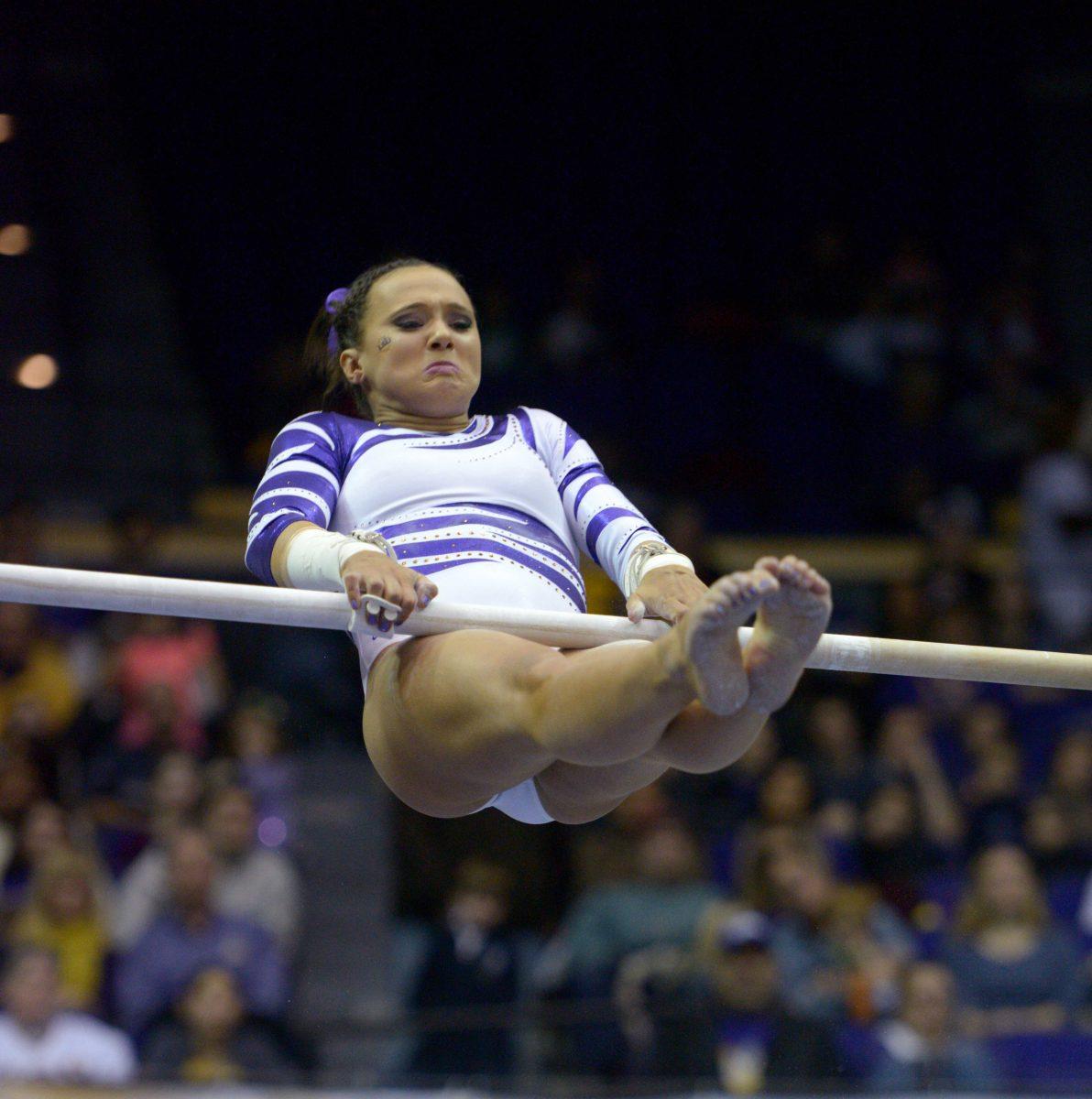 LSU sophomore Ashleigh Gnat performs a bars routine on Friday, Jan. 23, 2015, during the Lady TIger's 197-192 victory against Missouri in the Pete Maravich Assembly Center.