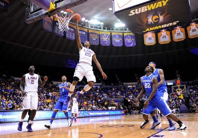 LSU freshman forward Jordan Mickey (25) lays up the ball Tuesday, Jan. 28, 2014 during the Tigers' 87-82 victory against Kentucky.