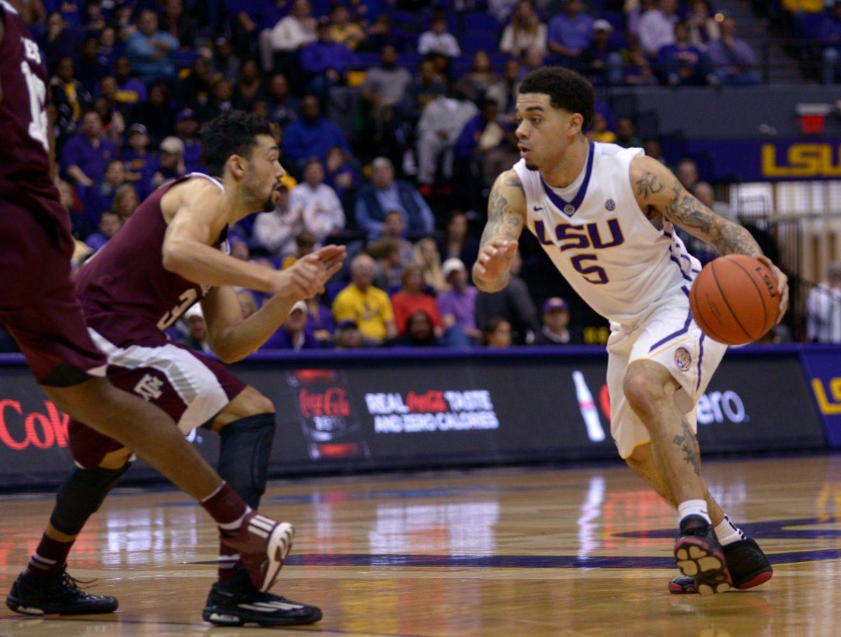 LSU junior guard Josh Gray (5) dribbles during Tigers' 67-64 defeat against Texas A&amp;M on Sturday, Jan. 17, 2015 in the Pete Maravich Assembly Center.