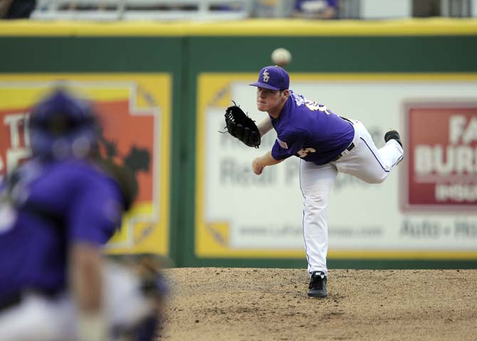 LSU freshman pitcher Jared Poche' (16) warms up Saturday, Mach 22, 2014, before the Tigers' 2-1 win against Georgia in Alex Box Stadium.