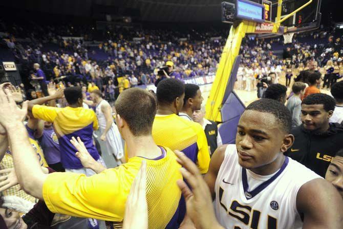 LSU sophomore forward Jarell Martin (1) greets the students after the Tigers' 70-63 victory against Florida on Saturday, Feb. 21, 2015 in the Pete Maravich Assembly Center.