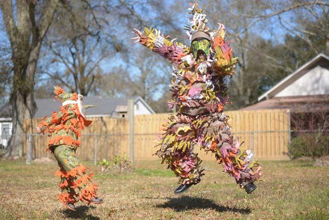 Examples of traditional Courir de Mardi Gras costumes in both child and adult sizes on Friday, Feb. 6, 2015.