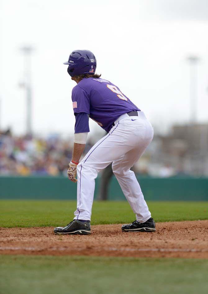 LSU junior outfielder Mark Laird (9) attempts to steal second base during the Tigers&#8217; 16-2 victory against Boston College on Saturday, Feb. 21, 2015 in Alex Box Stadium.