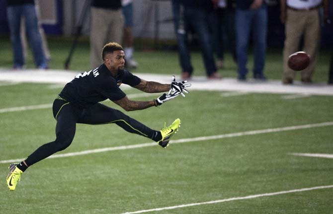 LSU junior wide receiver Odell Beckham Jr. (3) attempts to catch a pass on Wednesday, April 9, 2014 during LSU Pro Day in the LSU Indoor Practice Facility.