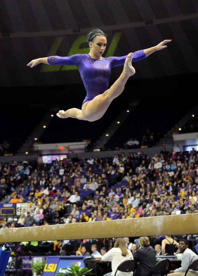 LSU sophomore all-around Shae Zamardi leaps above the beam Friday, Jan. 9, during the Tigers' win 197-193 against Iowa State in the PMAC.