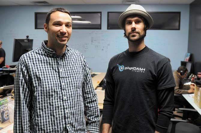 Pixel Dash Studios co-founders Jason Tate and Evan Smith pose for a portrait Friday, Feb. 20, 2015, in their studio.