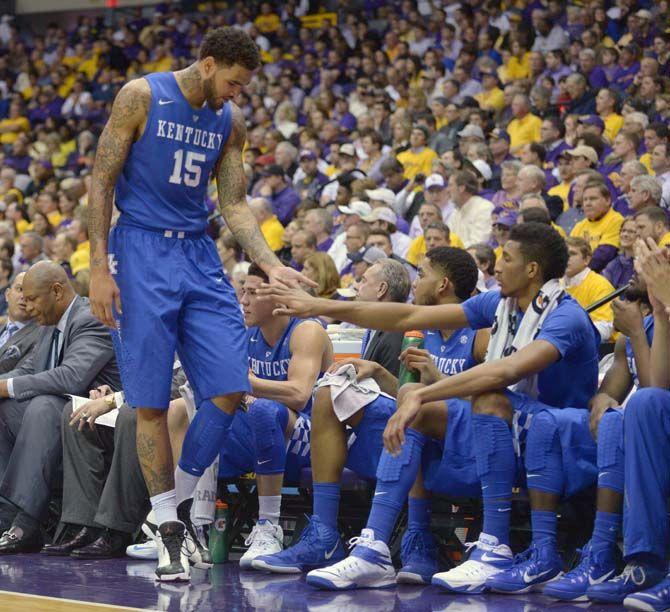 Kentucky junior forward Willie Cauley-Stein (15) high fives his teamates during the Tigers' 71-69 defeat on Tuesday, Feb. 10, 2015 in the Pete Maravich Assembly Center.