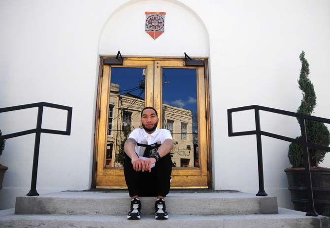 New Orleans native and designer Brennan Manuel models a button-down from his '6 AM' brand.