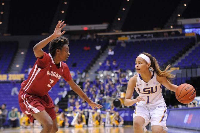 LSU freshman guard, Jenna Deemer (1), moves the ball up the court on Sunday during the tigers' 51-39 victory against Alabama on Sunday, Feb. 8, 2015 in the Pete Maravich Assembly center.