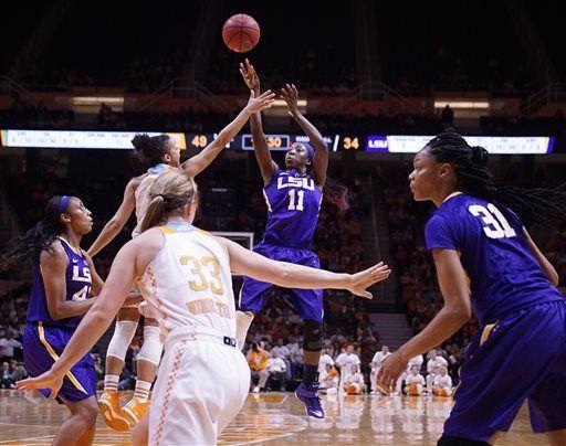 LSU's Raigyne Moncrief (11) shoots a basket against Tennessee's Andraya Carter, second from back left, in the second half of an NCAA college basketball game Thursday, Jan. 22, 2015, in Knoxville, Tenn. (AP Photo/Patrick Murphy-Racey)