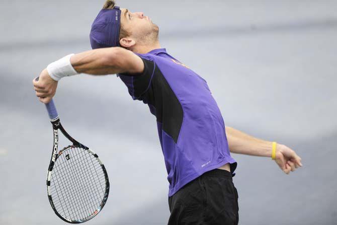 LSU sophomore Jordan Daigle begins his serve on Saturday, Jan. 31, 2015, during the Tigers' 7-0 victory against Purdue at W.T. "Dub" Robinson Stadium.