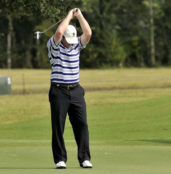 Junior Ben Taylor celebrates after a shot Saturday, October 5, 2013 at the fifth-annual David Toms Intercollegiate at the University Club.