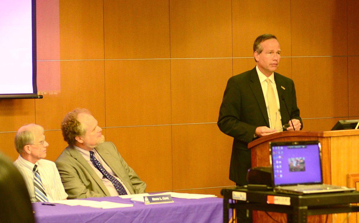 F. King Alexander (right) speaks at the Faculty Senate meeting Thursday September 4, 2014.