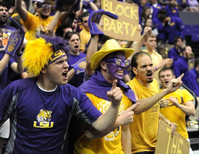 The LSU student section celebrates after a dunk Saturday, Feb. 1, 2014 during the Tigers' 88-74 victory against Arkansas at the PMAC.