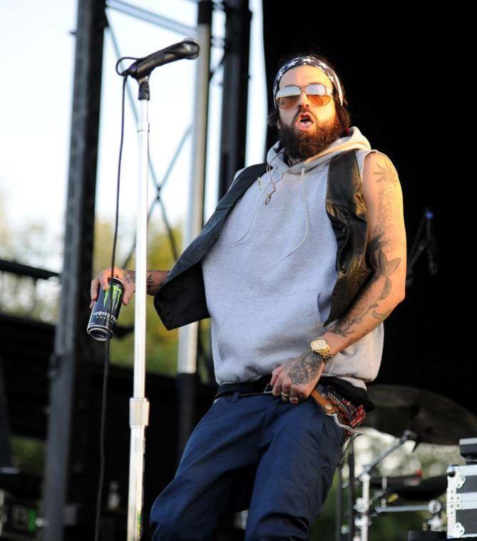 Michael Wayne Atha, known by his stage name Yelawolf, enters the stage April 14, 2013 during Groovin' on the Grounds at the LSU Parade Grounds.