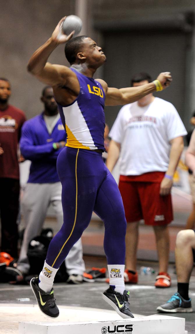 LSU sophomore Rodney Brown throws a spot on Friday, Feb. 15, 2013 during the LSU Twilight Meet at the Carl Maddox Field House.