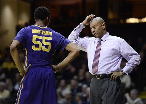 LSU coach Johnny Jones talks with guard Tim Quarterman (55) during the first half of an NCAA college basketball game against Vanderbilt on Saturday, Jan. 24, 2015, in Nashville, Tenn. (AP Photo/Mark Zaleski)