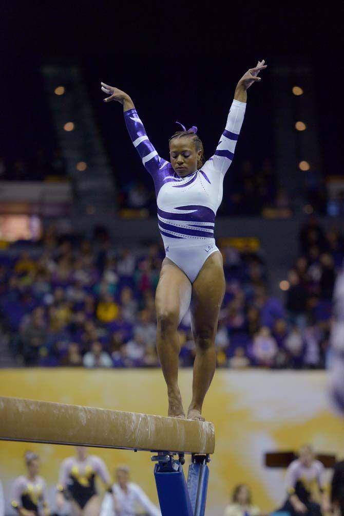 LSU senior Lloimincia Hall performs a balance beam routine on Friday, Jan. 23, 2015, during the Lady TIger's 197-192 victory against Missouri in the Pete Maravich Assembly Center.