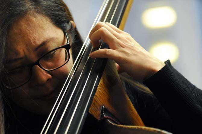 LSU Professor of Double Bass, Yung-Chiao Wei, prepares her students for the upcoming LA Bass Festival on Wednesday, Feb. 4, 2015 in the School of Music