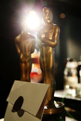 A pair of prop Oscars are seen during rehearsals for the 87th Academy Awards in Los Angeles, Wednesday, Feb. 18, 2015. The Academy Awards will be held at the Dolby Theatre on Sunday, Feb. 22. (Photo by Matt Sayles/Invision/AP)