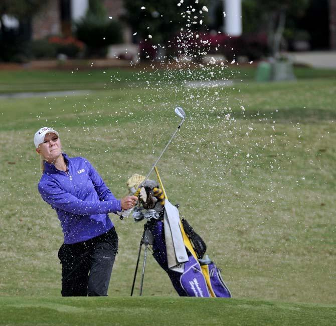 LSU sophomore Madelene Sagstrom strikes the ball Sunday, March 24, 2013 on the last hole of her game at the University Club golf course.