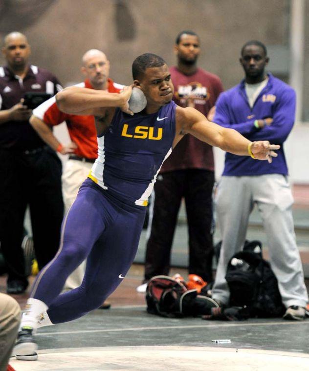 LSU sophomore Rodney Brown throws a spot on Friday, Feb. 15, 2013 during the LSU Twilight Meet at the Carl Maddox Field House.