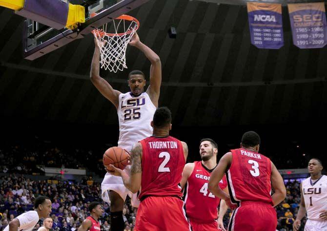 LSU sophomore forward Jordan Mickey (25) dunks the ball into the basket on Saturday, Jan. 10, 2015, during the Tigers' 87-84 win against Georgia in the Pete Maravich Assembly Center.