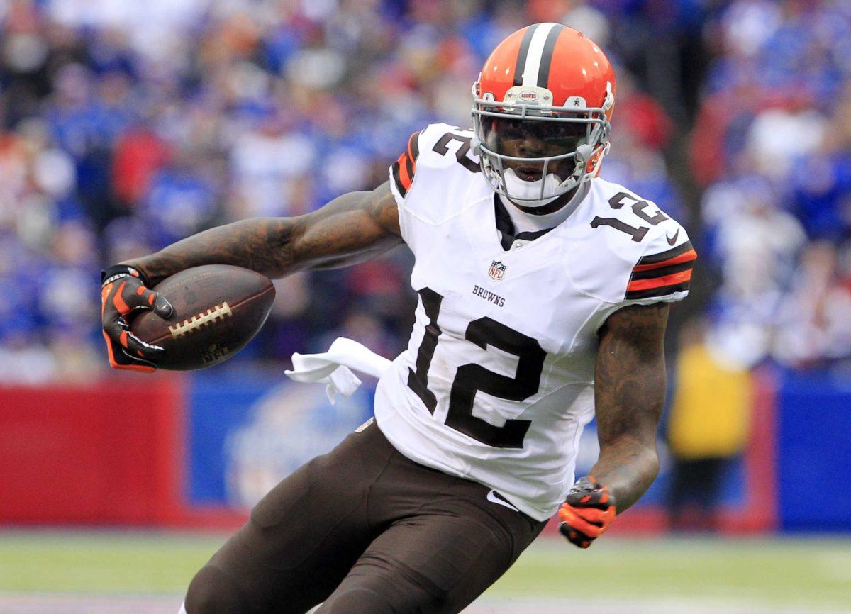 FILE - In this Nov. 30, 2014, file photo, Cleveland Browns wide receiver Josh Gordon carries the ball after a reception against the Buffalo Bills during the first half of an NFL football game in Orchard Park, N.Y. The Browns say they are disappointed about a report that troubled wide receiver Gordon has failed another drug test and could be facing a one-year NFL ban. Gordon was suspended for 10 games last season for another violation of the league's drug policy. He appeared in just five games and was suspended by the Browns for violating team rules before the season finale. (AP Photo/Bill Wippert, File)