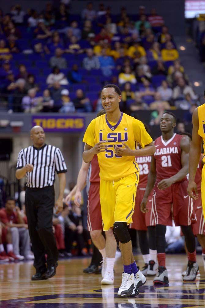 LSU sophomore guard, Tim Quarterman (55), smiles on the court while the Tigers are ahead in their 71-60 victory against Alabama on Saturday, Feb. 7, 2015, in the Pete Maravich Assembly Center.