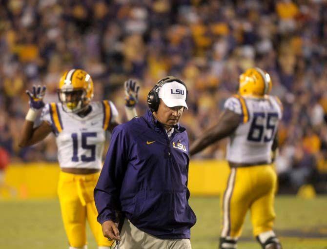 LSU football head coach Les Miles looks down during Tiger's 10-7 victory against Ole Miss Satruday, October 25, 2014 in Tiger Stadium