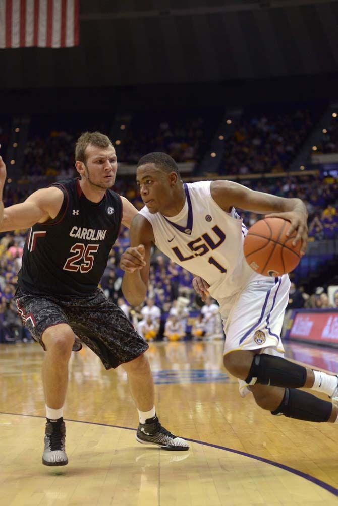 LSU sophomore forward Jarell Martin (1) dribbles past opponent during the Tigers' 64-58 victory over South Carolina on Wednesday, Jan. 28, 2015 at the Pete Maravich Assembly Center.