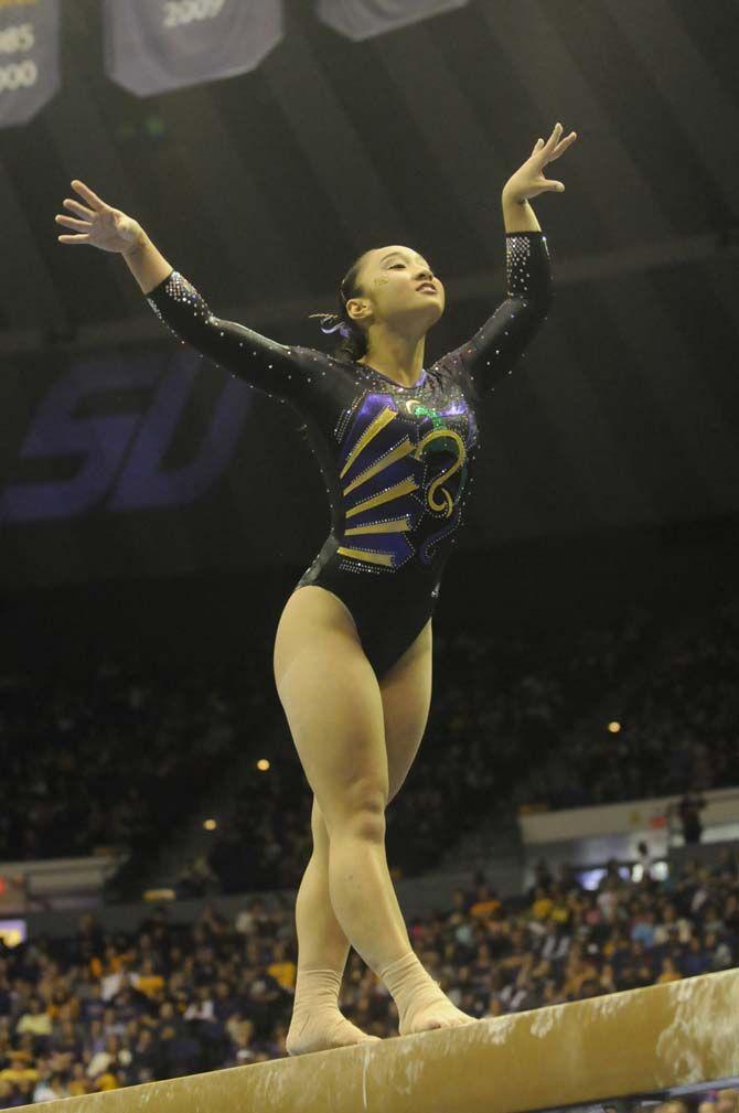 LSU freshman all around Erin Macadaeg performs her beam routine during the Tigers' 197.950-197.425 victory against Florida on Friday, Feb. 20, 2015 in the Pete Maravich Assembly Center