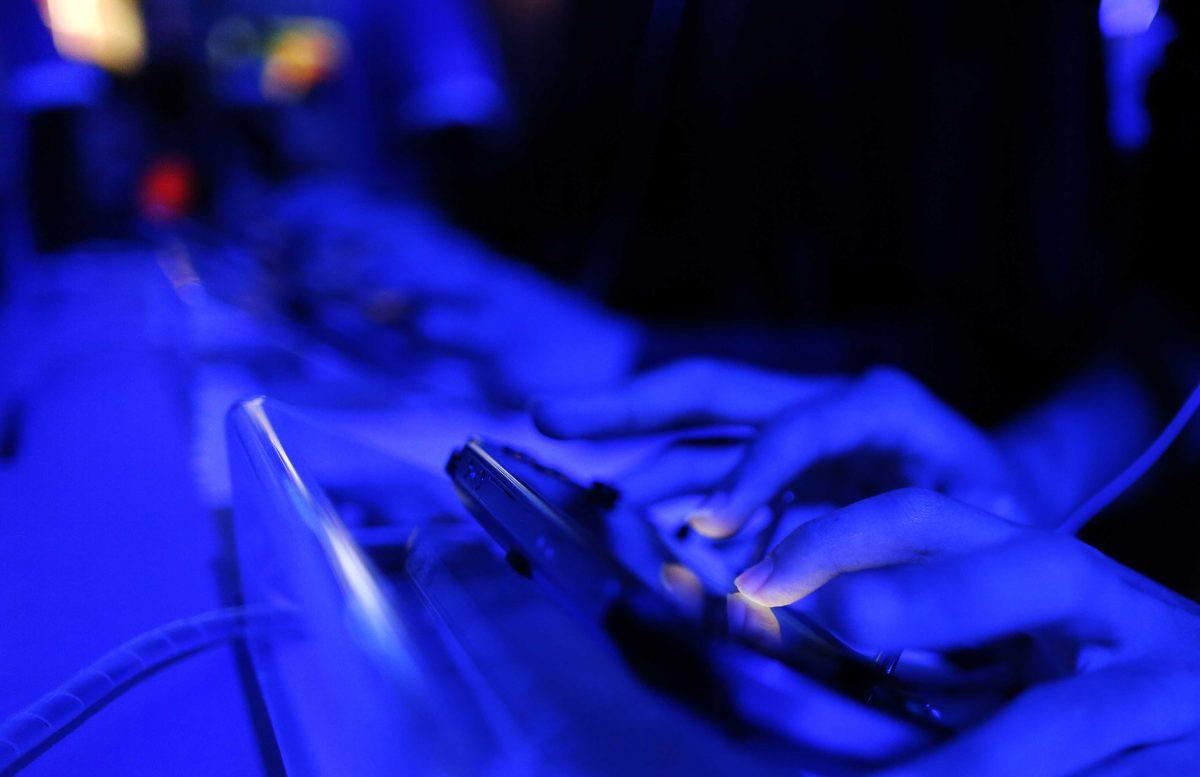 Visitors use PlayStation gaming products during the Taipei Game Show in Taipei, Taiwan, Wednesday, Jan. 28, 2015. The game show, one of the leading digital interactive gaming events in Asia, will run from Jan. 28 through Feb. 1. (AP Photo/Wally Santana)