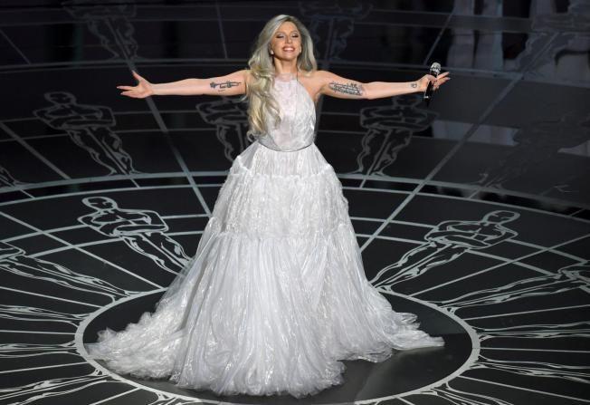 Lady Gaga performs on stage at the Oscars on Sunday, Feb. 22, 2015, at the Dolby Theatre in Los Angeles. (Photo by John Shearer/Invision/AP)