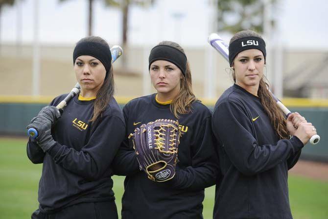 LSU sophomore catcher Sahvanna Jaquish, left, sophomore pitcher Baylee Corbello, center, and sophomore outfielder Bailey Landry look forward to their start of the 2015 Lady Tigers softball season Friday, Feb. 6, 2015 at Tiger Park.