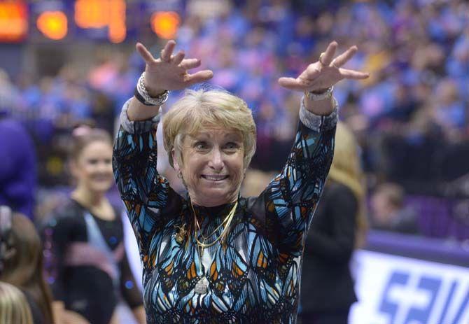 LSU gymnastics head coach D-D Breaux supports her team during the Tigers' 198.075-196.850 victory against No. 9 Georgia on Friday, Feb. 6, 2015. in the PMAC.