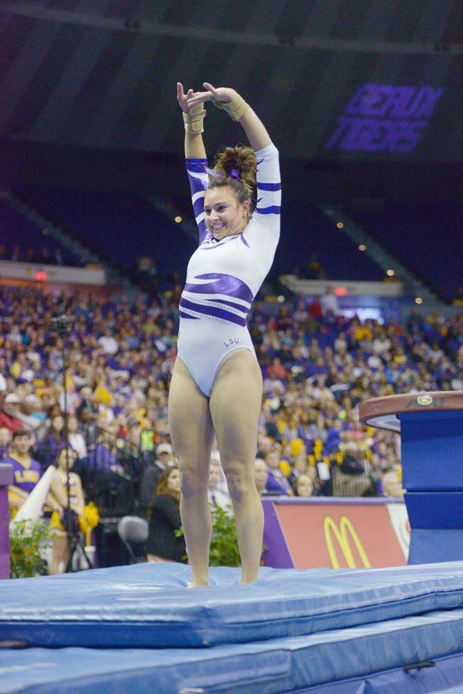 LSU senior Scarlett Williams participates in the vault routine on Friday, Jan. 23, 2015, during the Lady Tiger's 197-192 victory against Missouri in the Pete Maravich Assembly Center.