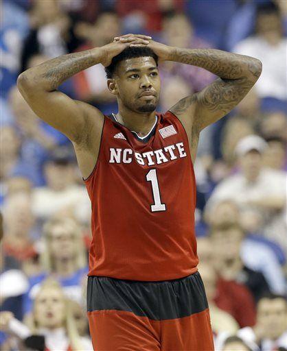 North Carolina State's Trevor Lacey reacts after being called for a foul against Duke during the first half of an NCAA college basketball game in the quarterfinals of the Atlantic Coast Conference tournament in Greensboro, N.C., Thursday, March 12, 2015. (AP Photo/Gerry Broome)