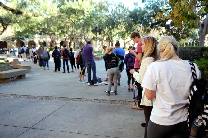 A line of students waiting to get into the Testing Center in Himes Hall stretches across the quad Tuesday, Nov. 19, 2013.