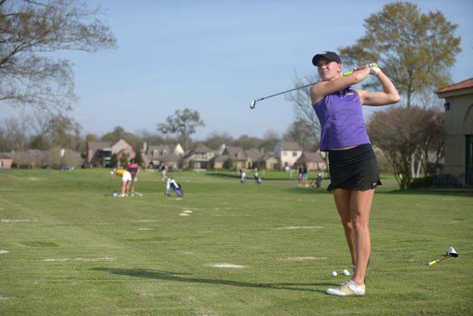 LSU senior Madelene Sagstrom swings to hit the ball during practice on Monday, March 16, 2015 at the University Club Golf Center.