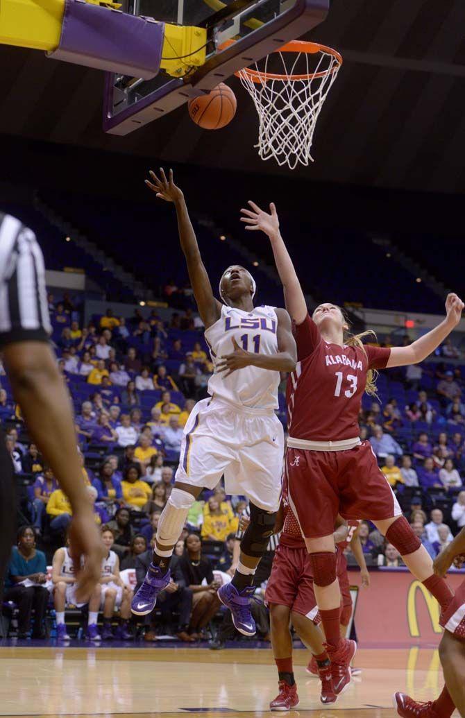 LSU sophomore guard, Raigyne Moncrief (11), shoots the ball during the Tigers' 51-39 victory against Alabama on Sunday, Feb. 8, 2015, in the Pete Maravich Assembly Center.