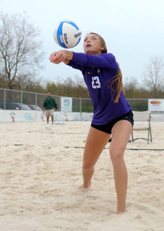 LSU junior sand volleyball player Helen Boyle (23) bumps the ball Wednesday, March 26, 2014, during the Tigers' 3-2 lost against Tulane at Coconut Beach Sand Volleyball Complex.