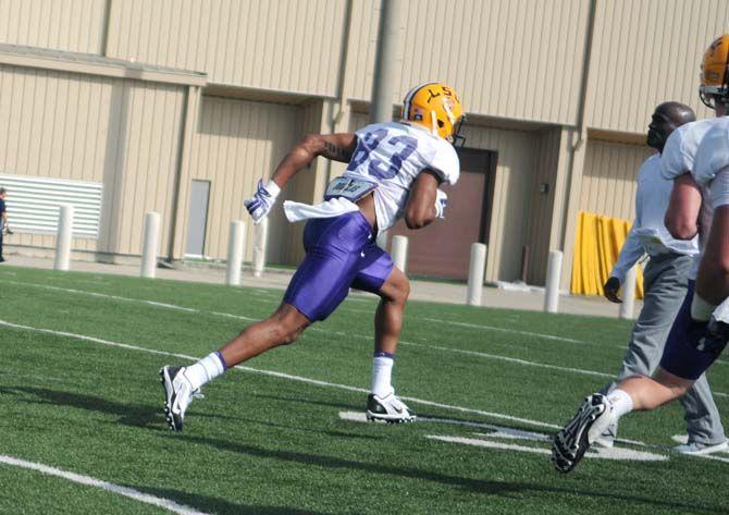 LSU junior WR Travin Dural (83) running on a drill on Tuesday, Mar. 17, 2015 during practice at the Football Operations practice field.