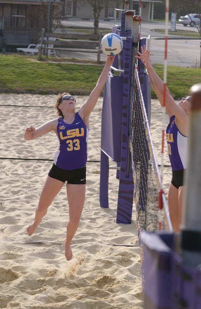 LSU freshman Toni Rodriguez (33) hits the ball during Scrimmage on Sunday, March 1, 2015 at Mango&#8217;s Beach Volleyball Club.