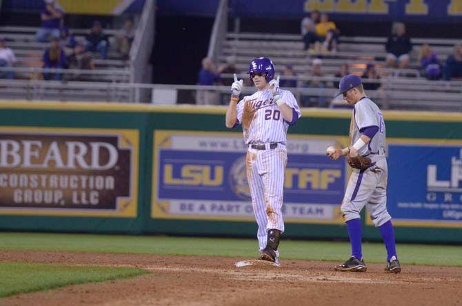 LSU senior infielder Connor Hale (20) celebrates safe run to second base during game against Stephen F. Austin Tuesday, Mar. 3, 2015 in the Alex Box Stadium.