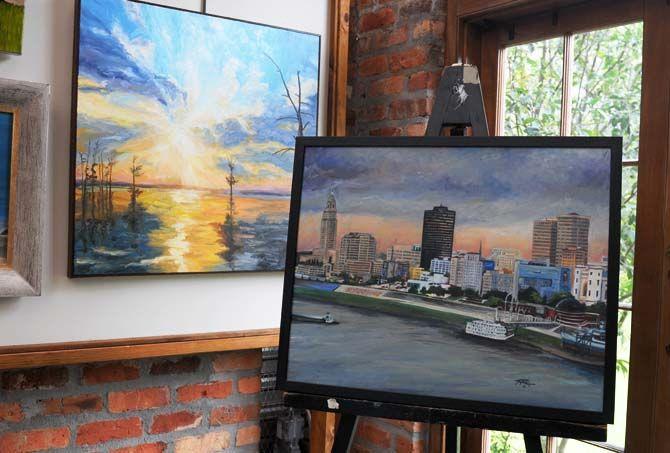 LSU studio arts senior Joseph Turpin's painting "Capital City" sits on an easel Wednesday, Mar. 18, 2015, before being hung in the juried fifth annual Brush with Burden art exhibition. The exhibit will run March 21-29 at the LSU Ag Center's Burden Center.