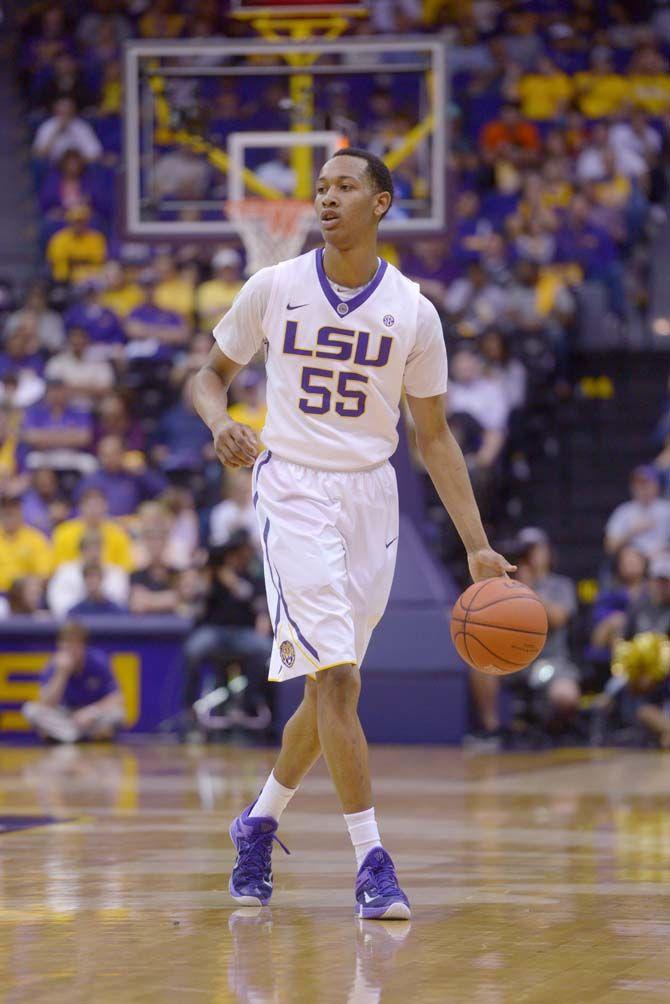 LSU sophomore guard Tim Quarterman (55) dribbles the ball Saturday, Feb. 21, 2015 during the Tigers' 70-63 victory against Florida in the Pete Maravich Assembly Center.